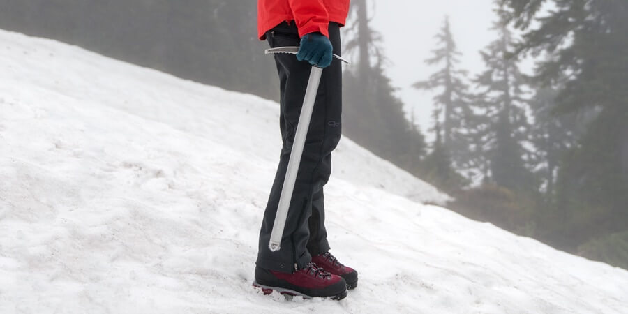 The spike at the base of the ice axe's shaft should be beside your ankle or slightly above it (about an inch or 2.5cm).