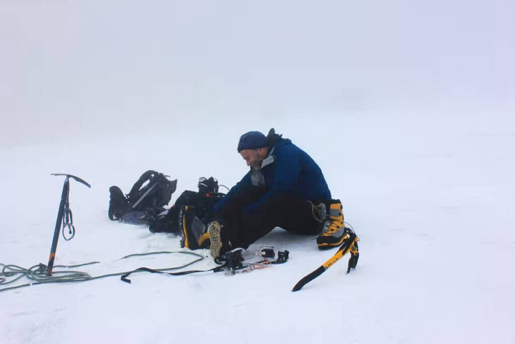 Preparing to take my first snowboard run down Alexandra glacier on Mt. Stanley