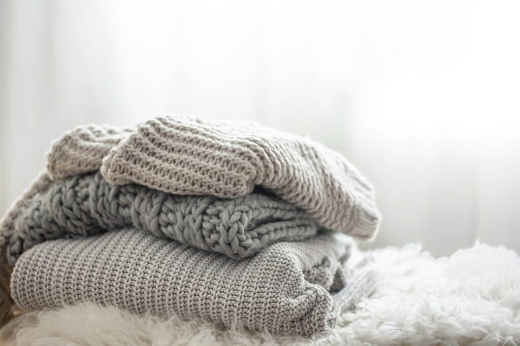 stacked cashmere sweaters