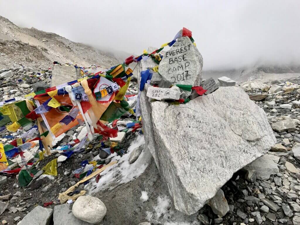Base Camp marker with Tibetan Prayer Flags.
