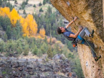 A sport climber assesses the next sequence of movements